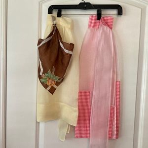 Aprons Two Beautiful Hand Made Vintage Aprons. Pink has cross stitch on both